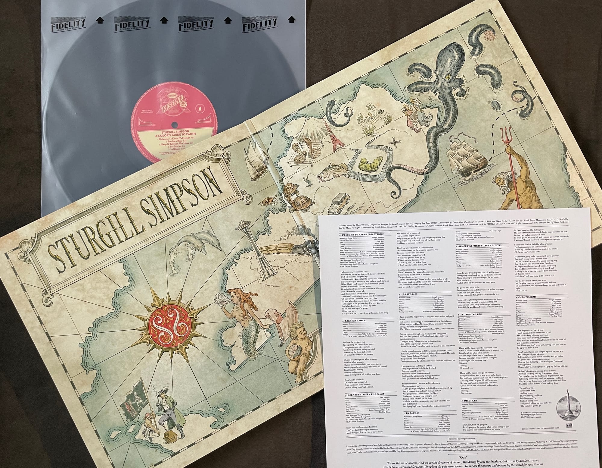 Contents of the Rhino Reserve pressing of A Sailor's Guide to Earth.