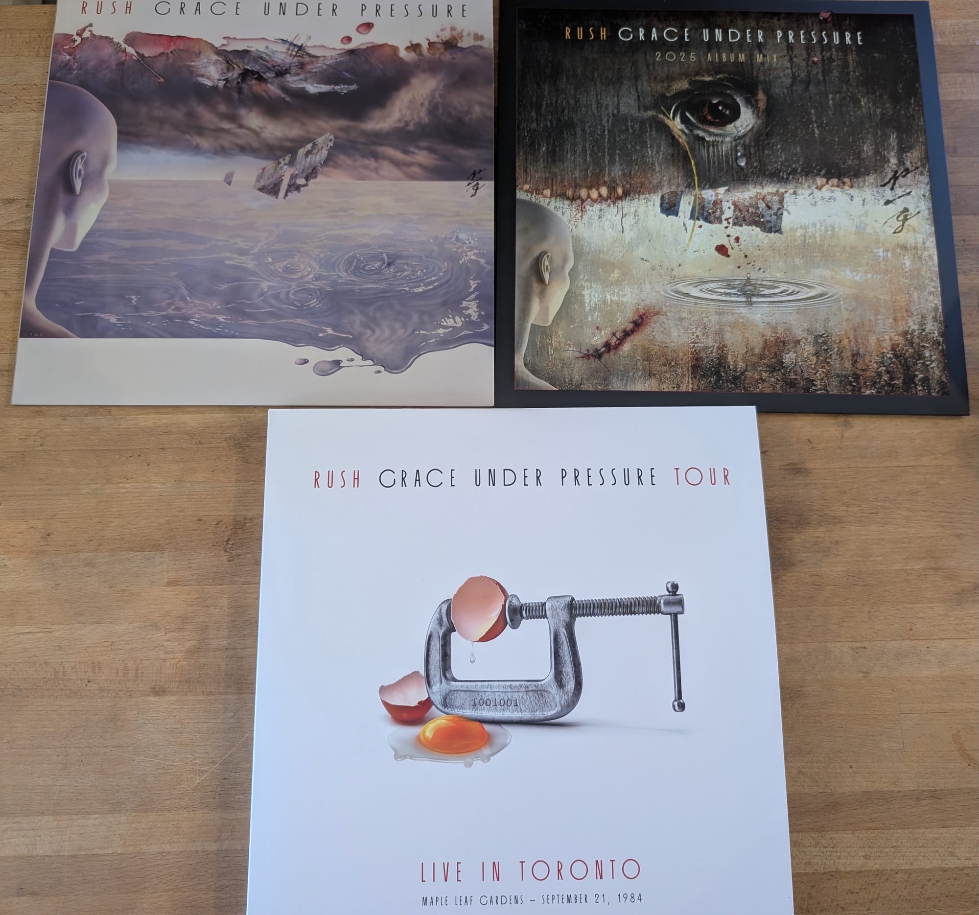 The three vinyl components for the super deluxe edition of Grace Under Pressure.